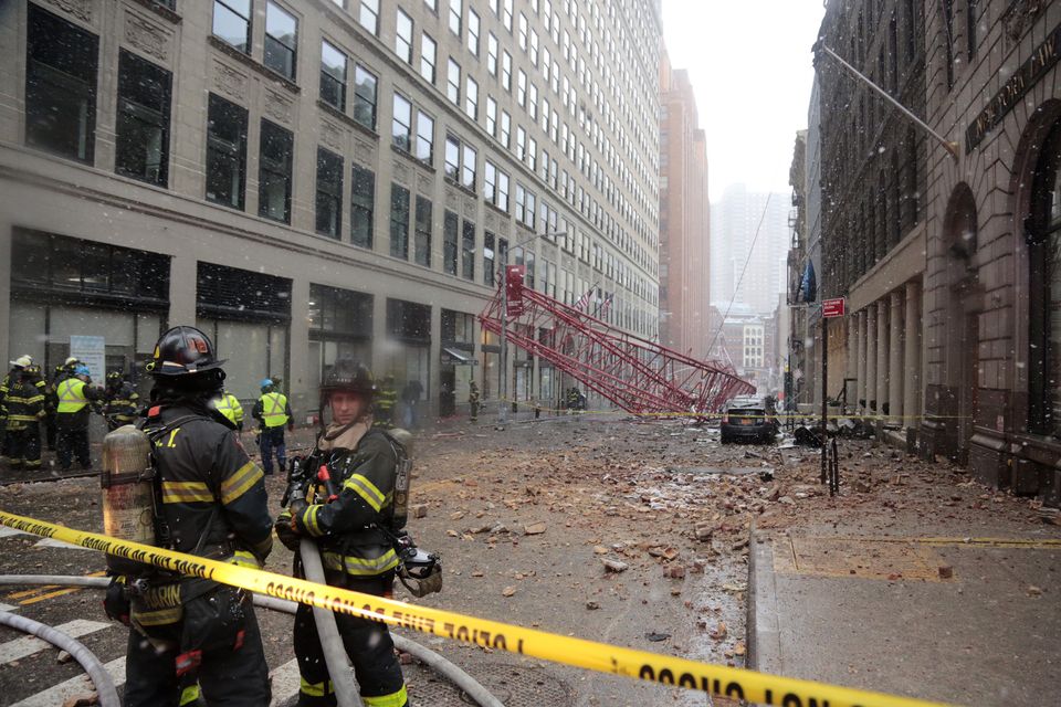 One killed as crane collapses on parked cars in NY  street